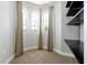 Bonus room featuring a bay window with curtains and closet shelving at 3844 Bowfin Trl, Kissimmee, FL 34746