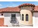 Architectural details of turret with red tile roof and balcony at 3844 Bowfin Trl, Kissimmee, FL 34746