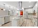 Open kitchen with a large island, stainless steel appliances, and ample cabinet space at 3844 Bowfin Trl, Kissimmee, FL 34746