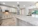 Bright kitchen with a large island, stainless steel appliances, and a breakfast nook at 3844 Bowfin Trl, Kissimmee, FL 34746