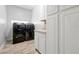 Laundry room features a side-by-side washer and dryer and storage at 3844 Bowfin Trl, Kissimmee, FL 34746