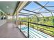 Enclosed lanai overlooking a refreshing pool, offering a private and relaxing outdoor retreat at 3844 Bowfin Trl, Kissimmee, FL 34746