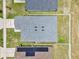 Overhead aerial roof view of a house surrounded by a grassy yard and neighboring houses at 4270 Swan St, Haines City, FL 33844