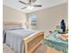 Comfortable bedroom with natural light, ceiling fan, and soft tones at 4270 Swan St, Haines City, FL 33844