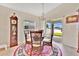 Bright dining area featuring hardwood floors and a view of the outdoor space at 4270 Swan St, Haines City, FL 33844
