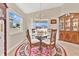 Cozy dining area with large windows, hardwood floors, and traditional decor at 4270 Swan St, Haines City, FL 33844
