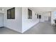 Hallway entrance showing exterior doors and windows, providing ample natural light at 530 E Central Blvd # 803, Orlando, FL 32801