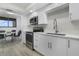 Contemporary kitchen with stainless steel appliances and white quartz countertops at 530 E Central Blvd # 803, Orlando, FL 32801