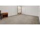 Neutral bedroom boasts ample carpeted floors and a blank canvas with electrical outlets and a blank canvas at 670 Cotulla Dr, Kissimmee, FL 34758