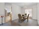 Bright dining room with elegant chandelier and neutral color palette, perfect for Gathering meals at 670 Cotulla Dr, Kissimmee, FL 34758