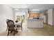 Eat in kitchen with barstool seating, slider, and ample counter space at 670 Cotulla Dr, Kissimmee, FL 34758