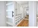 Spacious walk-in closet with custom shelving, drawers, and a full-length mirror at 6700 Tamarind Cir, Orlando, FL 32819