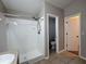 Bathroom featuring a walk-in shower and tiled floors at 703 Tartan Loop, Lake Wales, FL 33853