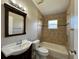 Bathroom with shower-tub combination and stylish vanity at 703 Tartan Loop, Lake Wales, FL 33853