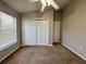 Neutral bedroom featuring carpeted floor, closet and vaulted ceilings at 703 Tartan Loop, Lake Wales, FL 33853