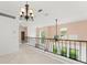Spacious second floor loft with chandelier at 7699 Milano Dr, Orlando, FL 32835