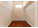 Spacious walk-in closet with custom shelving and hardwood floors at 7699 Milano Dr, Orlando, FL 32835