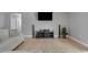 Cozy living room with a TV, speakers, and tile floors, perfect for entertaining at 812 Deep Wood Ct, Fruitland Park, FL 34731