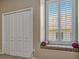 Bedroom with window seat and shutters at 887 Lancer Cir, Ocoee, FL 34761