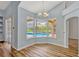 Dining area with bay windows overlooking a private screened-in pool at 887 Lancer Cir, Ocoee, FL 34761