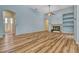 Spacious living room with a fireplace and built-in shelving at 887 Lancer Cir, Ocoee, FL 34761