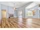 Spacious living room featuring a fireplace and sliding doors to the outdoor pool area at 887 Lancer Cir, Ocoee, FL 34761