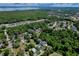 Scenic aerial view of community featuring nearby Lake Jesup and lush tree coverage at 934 Jessamy St, Oviedo, FL 32765