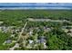 Scenic aerial view of community featuring nearby Lake Jesup and lush tree coverage at 934 Jessamy St, Oviedo, FL 32765