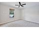 Neutral bedroom with window and ceiling fan at 934 Jessamy St, Oviedo, FL 32765