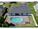 Aerial view of backyard with in-ground pool and brick paver patio, perfect for entertaining at 934 Jessamy St, Oviedo, FL 32765
