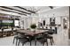 Open-concept living and dining area with a spacious layout, modern furnishings, and stylish decor at 960 Club Cresswind Dr, Lady Lake, FL 32159