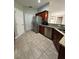 Kitchen with stainless steel appliances, granite countertops, and dark wood cabinetry at 112 Tulip Ln, Kissimmee, FL 34759
