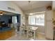 Eat-in kitchen with vaulted ceilings and convenient access to the living area at 11435 Aries Dr, Orlando, FL 32837