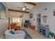Inviting living room with neutral walls, vaulted ceilings, and tile flooring at 11435 Aries Dr, Orlando, FL 32837