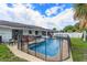 Beautiful fenced pool and hot tub, surrounded by a patio, perfect for relaxing and entertaining at 11435 Aries Dr, Orlando, FL 32837