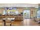 Relaxing bar with several seats and TVs, near exit to pool at 1217 Reunion Village Blvd, Kissimmee, FL 34747