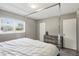 Calm bedroom with a dresser, closet and large window that lets in natural light at 1301 Lawne Blvd, Orlando, FL 32808
