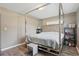 Cozy bedroom featuring a modern bed frame, neutral colors, and wood-look flooring at 1301 Lawne Blvd, Orlando, FL 32808