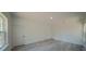 Bright bedroom with wood-look floors, neutral walls, and ample closet space at 13419 Sw 77Th Ave, Ocala, FL 34473