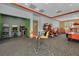 Bright game room with various arcade games and seating, perfect for community entertainment at 14781 Old Thicket Trce, Winter Garden, FL 34787