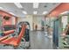 Well-equipped fitness center featuring weights, machines, and ample space for workouts at 14781 Old Thicket Trce, Winter Garden, FL 34787
