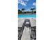 Community pool area with sun loungers, perfect for relaxation and soaking up the sun at 17148 Cagan Crossings Blvd, Clermont, FL 34714