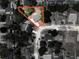 Aerial view of home on a corner lot surrounded by mature trees and well-maintained landscaping at 1742 Willa Cir, Winter Park, FL 32792