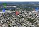 Aerial view showing a residential neighborhood with schools, shopping and roadways nearby at 1742 Willa Cir, Winter Park, FL 32792