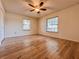 An empty bedroom with hardwood floors and a ceiling fan at 1742 Willa Cir, Winter Park, FL 32792