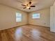An empty bedroom with hardwood floors and a ceiling fan at 1742 Willa Cir, Winter Park, FL 32792