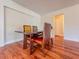 Cozy dining room featuring wood floors, comfortable seating, and natural light at 1742 Willa Cir, Winter Park, FL 32792