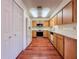 Traditional kitchen featuring wood cabinets, white countertops, and stainless steel appliances at 1742 Willa Cir, Winter Park, FL 32792