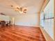 Bright living space with an open floor plan, hardwood floors, and large windows at 1742 Willa Cir, Winter Park, FL 32792