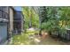 Expansive backyard with a partially covered patio that provides a serene outdoor living space at 1748 Foxhall Cir # 1748, Kissimmee, FL 34741